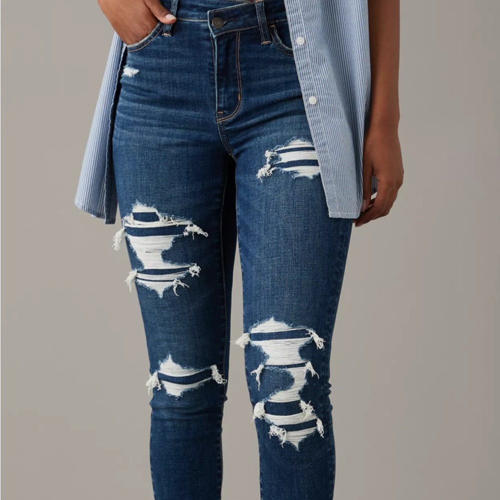 American Eagle Blue Skinny Jeans with Fashionable Distressing